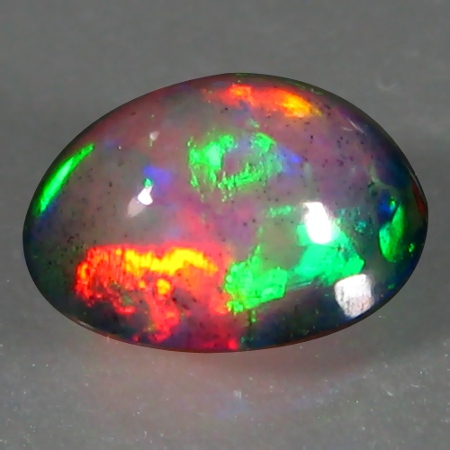 OP285 Oval Cabochon 1.24cts 9.2X7mm Multi Color Play Natural Ethiopia Black Opal